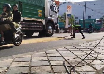 Cuma Hendak Isi BBM, Aksi Aipda Herman di Jalan Ahmad Yani Jadi Perhatian